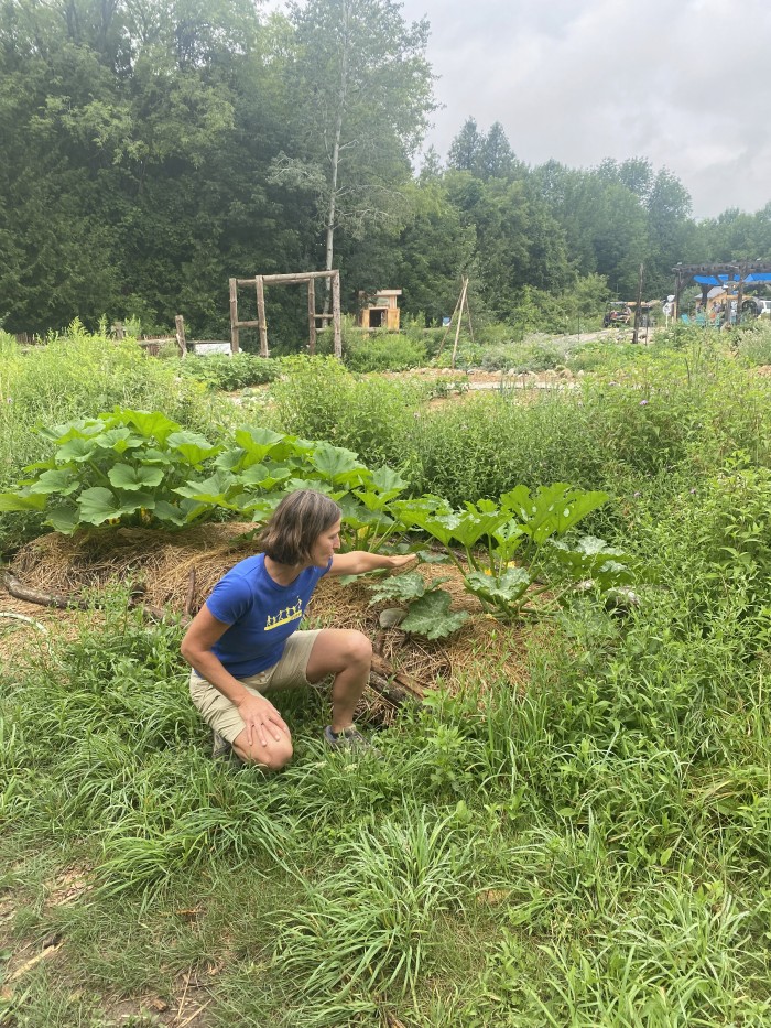 Simona Frieberg showing off the Riverstone Eco - Retreat garden