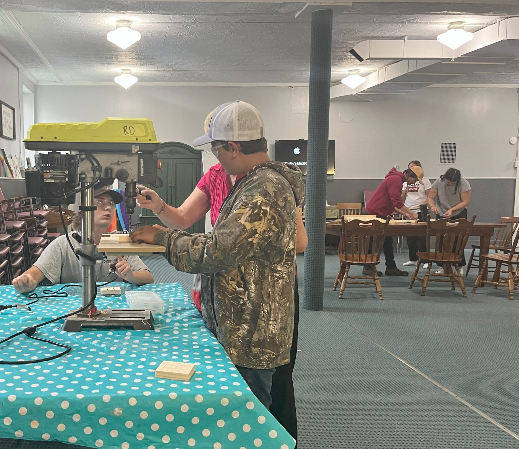 Youth participants are taught woodworking techniques and safety considerations in The Triple S Skills Project.